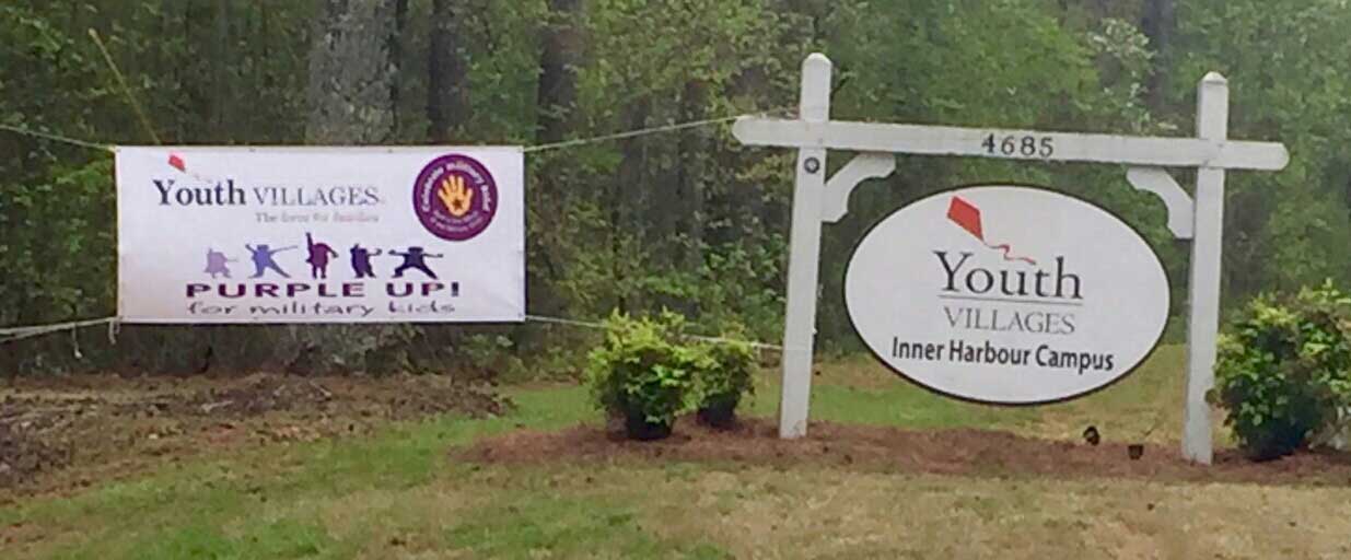 MOMC-Banner-and-Front-Sign Month of the Military Child sign with Inner Harbour sign