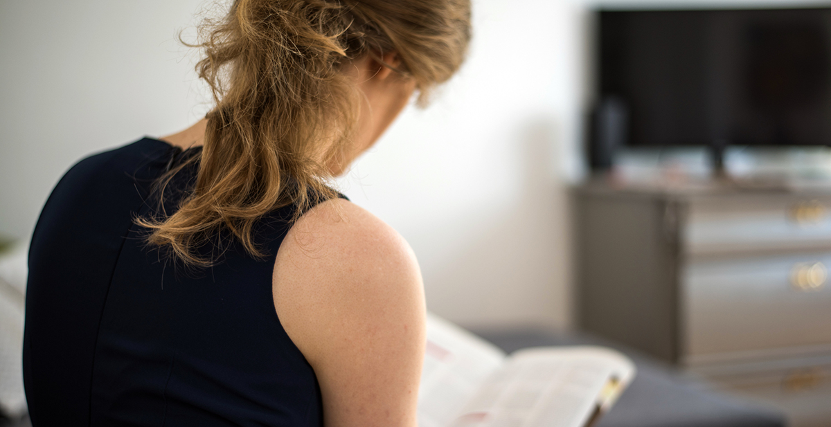 Stock Reading woman reading a book